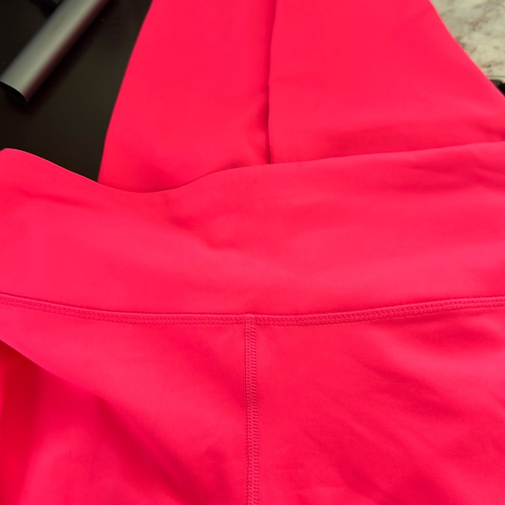 NWOT never worn or washed/dried Bright Coral Leggings